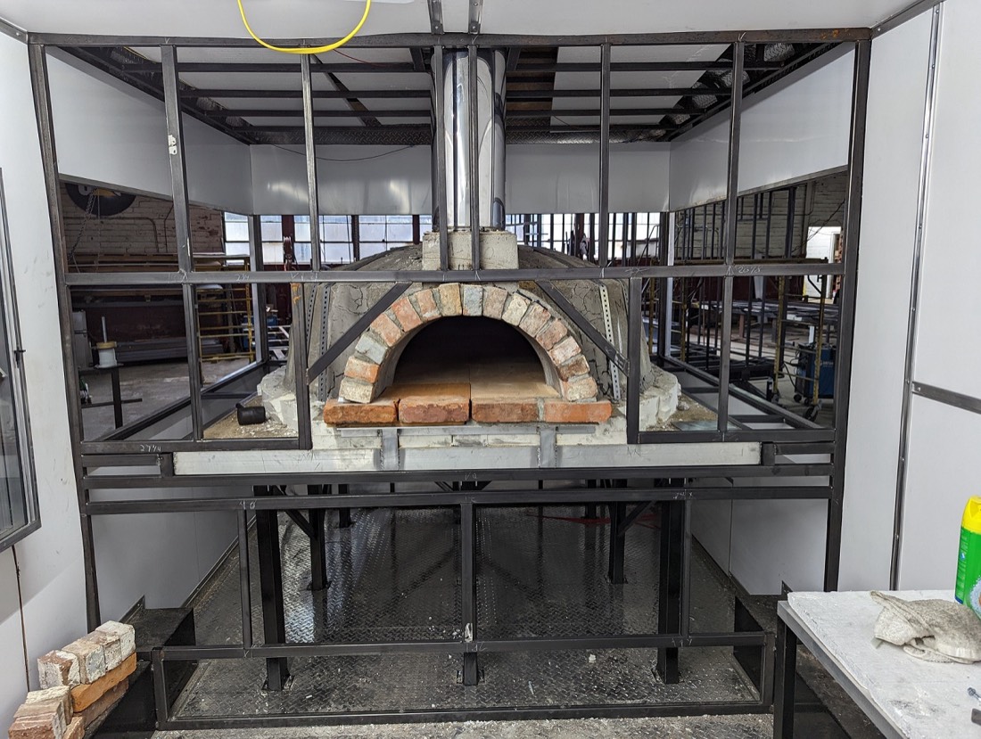 Wall frame around oven